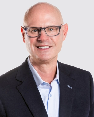 smiling person in professional attire